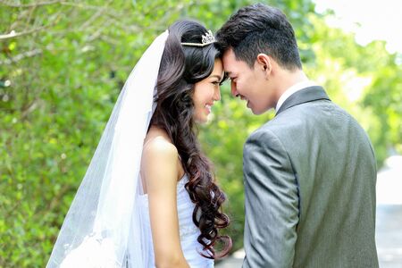 portrait of happiness of bride and groom being togetherの写真素材