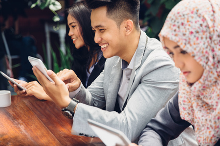 portrait of business people meeting busy working with team at a cafeの写真素材