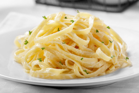 close up portrait of italian cuisine tagliatelle with carbonara sauce