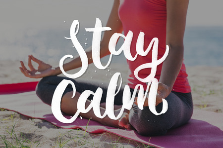 stay calm. close up portrait of hand and body of woman doing meditation pose outdoor as a backgroundの写真素材