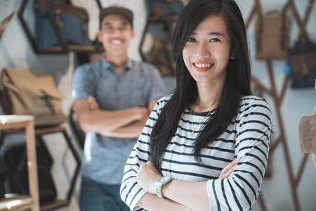 portrait of two young asian business owner at their storeの写真素材