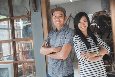 portrait of two young asian business owner at their storeの写真素材
