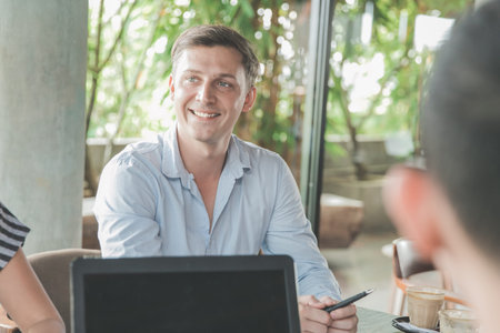 close up of a man meeting in a coffee shop