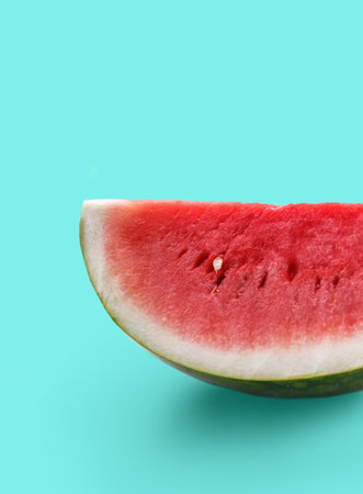 close up portrait of fresh watermelon on pastel green background