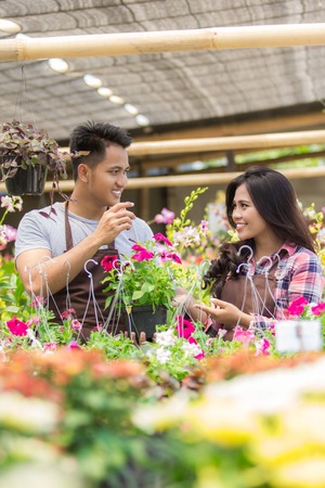 asian male and female floristの写真素材