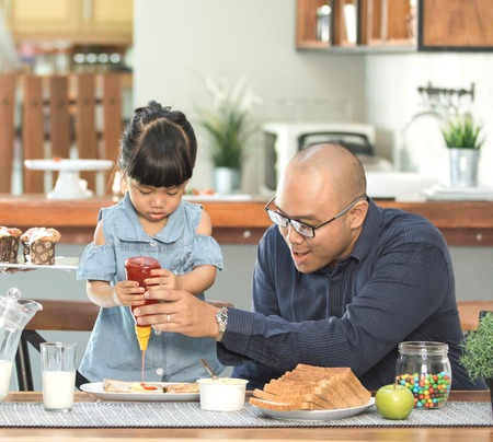 having a breakfast with familyの写真素材