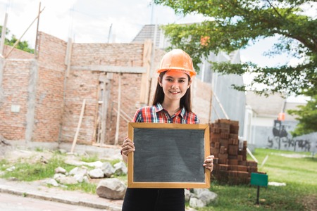 contractor holding blank black boardの写真素材