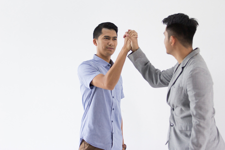 Asian Young Business shake handの写真素材