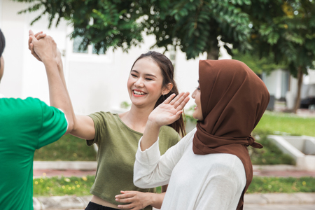 friends having fun chat after exercisingの写真素材