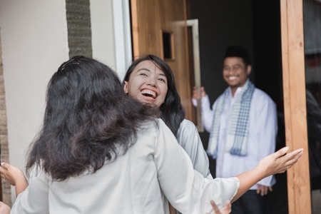 family forgiving and apologizing each other. eid mubarakの写真素材