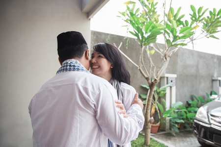 family forgiving and apologizing each other. eid mubarakの写真素材
