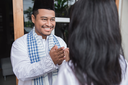 family forgiving and apologizing each other. eid mubarakの写真素材