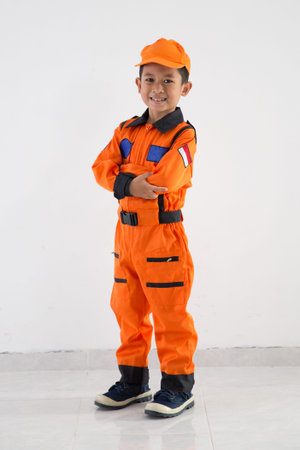asian little boy with technician, engineer or astronaut uniformの写真素材