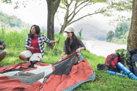 girl prepare tent nature tourism conceptの写真素材