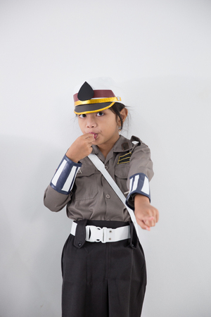 kid pretending to be police officerの写真素材