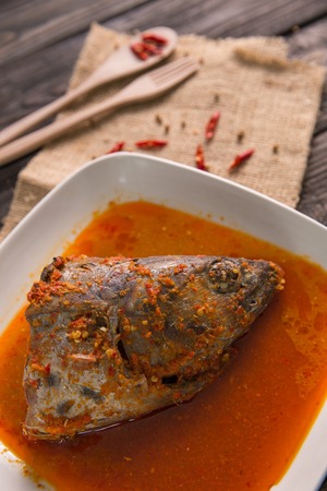 traditional indonesian dishes fish head gulaiの写真素材