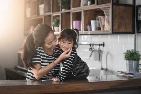 beautiful moment with mum at homeの写真素材