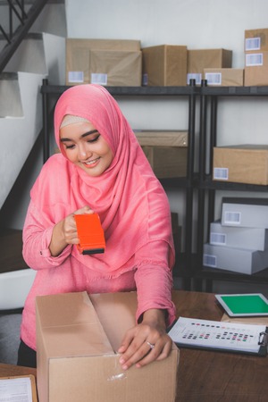 ecommerce entrepreneur preparing productの写真素材