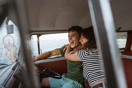 Cheerful young couple on a road trip