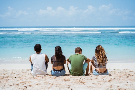 portrait of togetherness with friends on the beachの写真素材