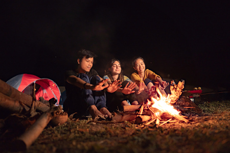 A group of friends having fun campingの写真素材