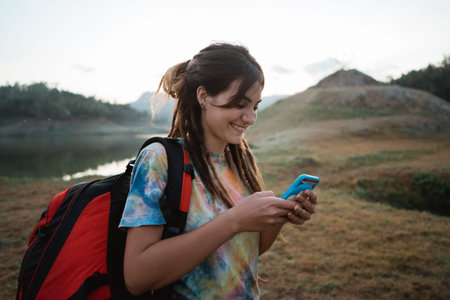 Caucasian woman hiker alone enjoy the beauty of nature