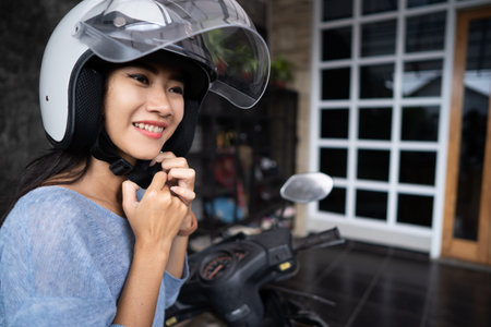 woman put a helmet on