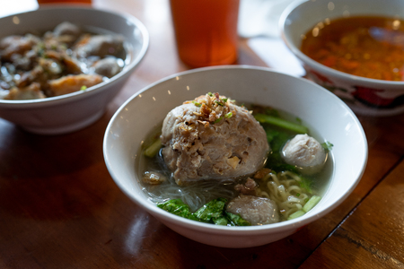 indonesian meatball with vegetable and soupの写真素材