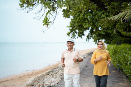 senior couple running and exercising outdoor