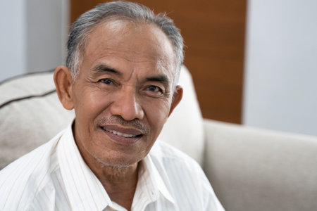 portrait of asian oldman smile when look at the camera