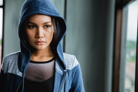 asian woman in sport wear indoorの写真素材