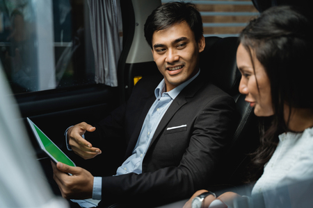 young business people meeting in the carの写真素材