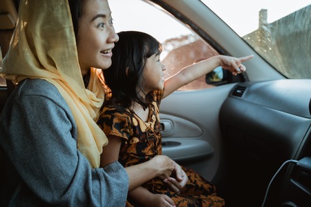 mom and kid enjoy their trip togetherの写真素材