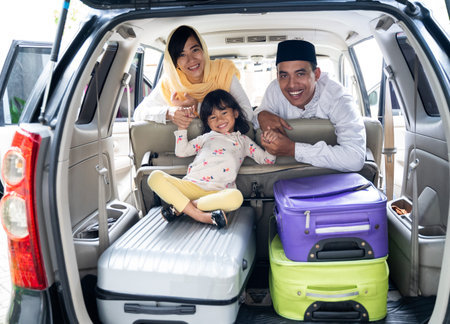 muslim family with suitcase before traveling