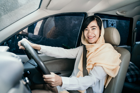 muslim woman drive carの写真素材