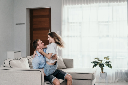 Young beautiful romantic couple kissingの写真素材