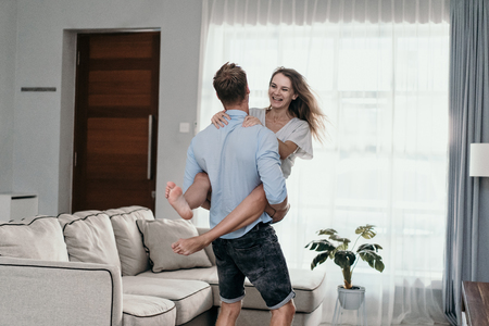 Young beautiful romantic couple kissingの写真素材