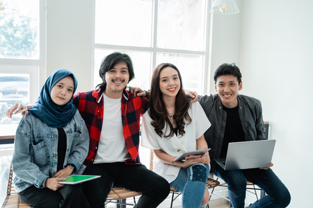asian bestfriend in cafe smiling to cameraの写真素材