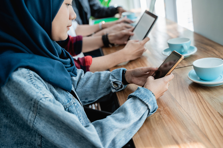 college student asian with friend in cafeの写真素材