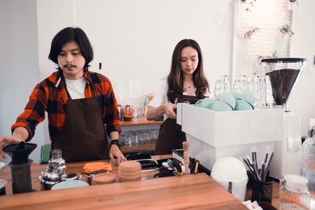 cafe barista preparing coffeeの写真素材