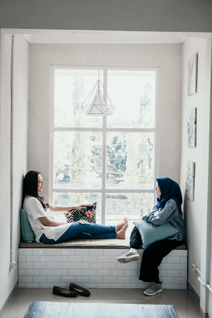 best friends enjoy talking to each otherの写真素材