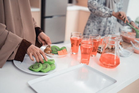 close up of hand preparing some food for break fasting in the afternoonの写真素材