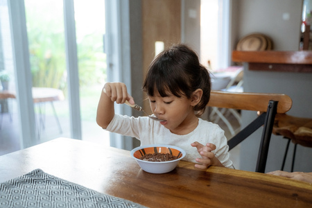 asian beautiful girl having breakfastの写真素材