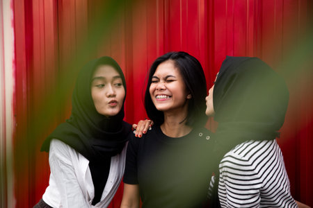 three women standing pose