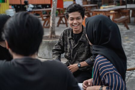 enjoy chatting and sharing with friendsの写真素材