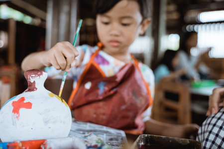 daughter learning about painting colorの写真素材