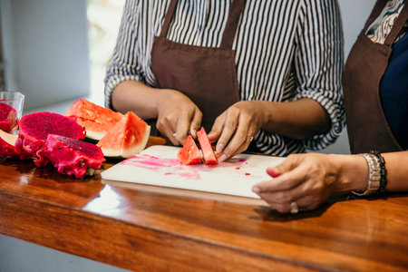 Two asian woman cooking in the kitchen