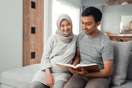 wife and husband learn how to read qoranの写真素材