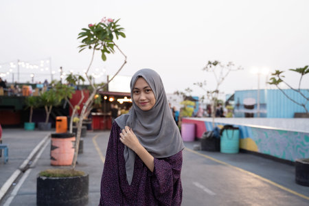 muslim female teenager smiling