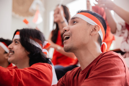 asian young male supporter of indonesia.